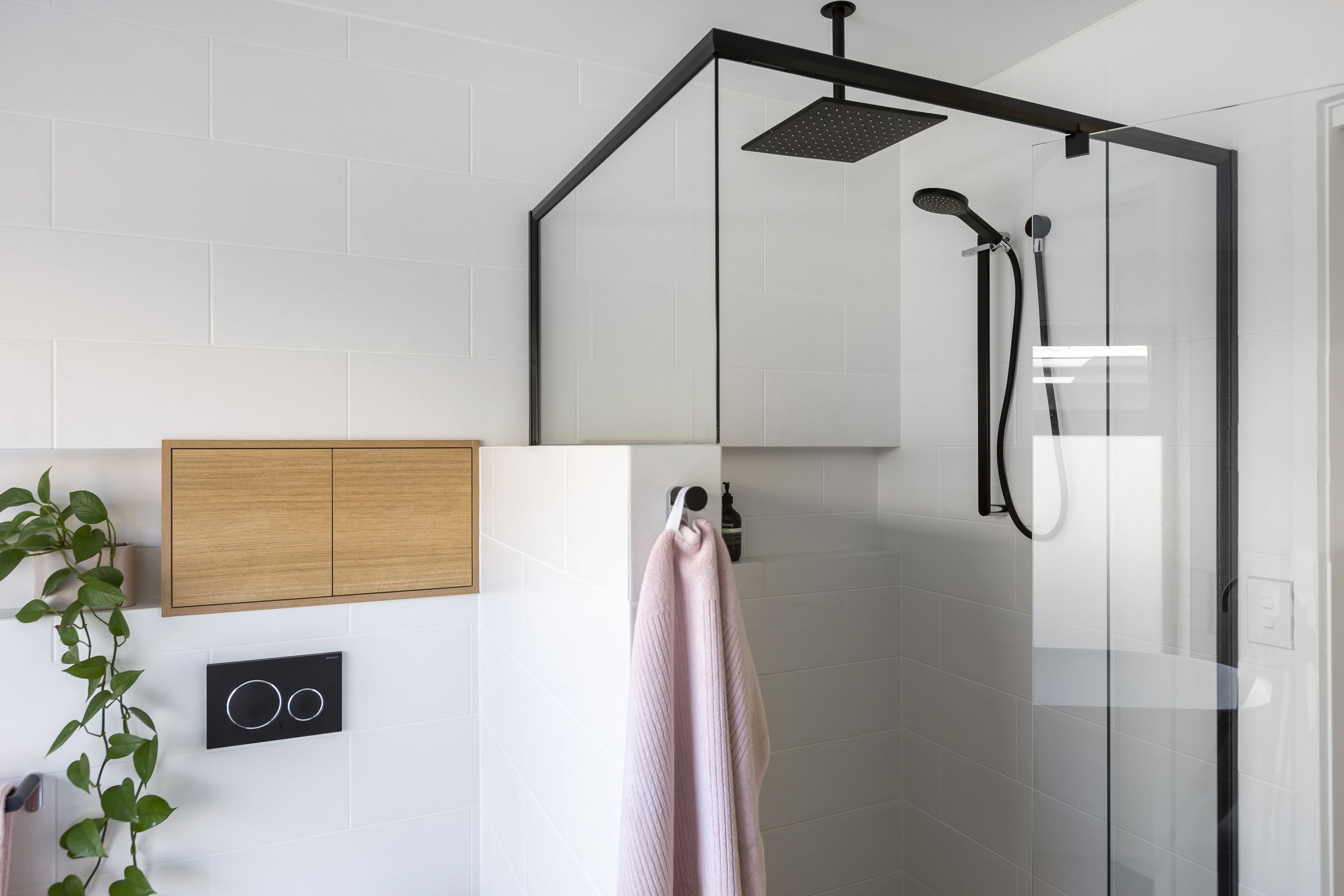 Bathroom renovation white with black features